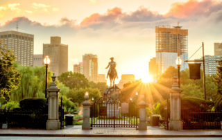 paul revere statue with boston skyline