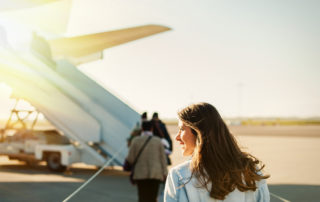 woman boarding a plane